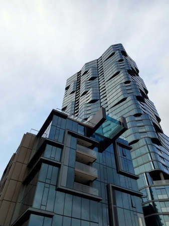 Honolulu - January 19, 2016: Luxury condo Anaha with see through pool overhanging the building at Ward Village in Kakaako, Hawaii.  Designed by world renowned architect, Bohlin Cywinski Jackson, in partnership with Architects Hawaiâi, Aeâo will includのeditorial素材