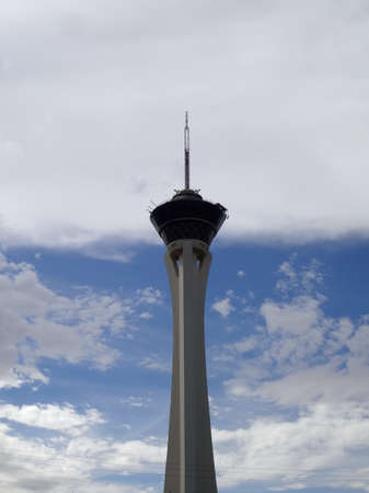 Las Vegas July 29, 2011: Stratosphere Tower in Cloudy sky.  Stratosphere Tower is over 900 feet tall and hosts three amusement rides; Big Shot, X-Scream and Insanity.のeditorial素材