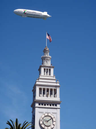San Francisco - September 17, 2009:  23andMe.com Ad on blimp above the Ferry Building Clock Tower.