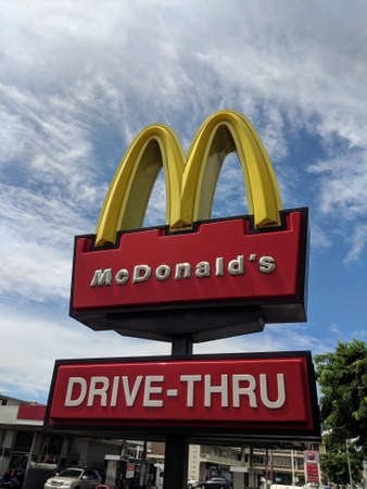 Honolulu - September 25, 2018: McDonalds Store Drive-Thru sign and logo in Honolulu, Hawaii. ...