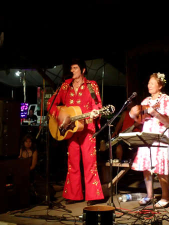 Kalapana, Hawaii -  November 12, 2014: band featuring Elvis look-a-like plays at Uncle Robert's Awa Bar and Farmers Market.のeditorial素材