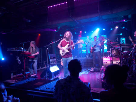 Honolulu - February 22, 2018: Mike Love Band plays music indoors with cool lighting at Crossroads at...