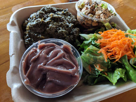 Hawaiian Lau Lau plate Served with Fresh/Day Old Poi in bowl, salad, Tofu poke in a cardboard...