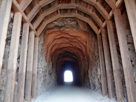 Wood beams hold up tunnel 3 made for trains to pass through the mountains as part of Hoover Dam Railroad system.の写真素材