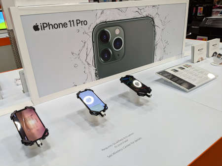 Honolulu - February 21, 2020:  Apple iPhone 11 Pro and Apple Watch on display inside a Costco.