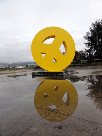 Oakland - February 24, 2011:  Peace sign reflecting in the water at the Oakland Museum of California (OMCA).のeditorial素材