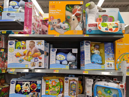 Honolulu - February 27, 2020: Baby Toys for sale inside Walmart Store.  Toys include Vtech, Bright Starts, Baby Einstein, and Fisher-Price brand items like books, teethers, mobile, and pillows.のeditorial素材
