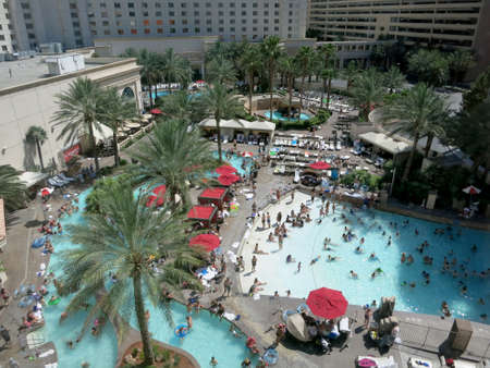 Las Vegas - June 29, 2015: Aerial of People play and hangout at Vegas Hotel Pool Party during the day.のeditorial素材