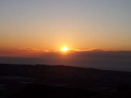 Sunset over clouds, Pacific Ocean and San Francisco Coast in California.の写真素材