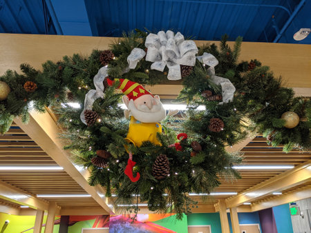 Honolulu - Hawaii - December 25, 2019:  Elf on a shelf hangs in Christmas reef dining room at Kapiolani Hospital.のeditorial素材