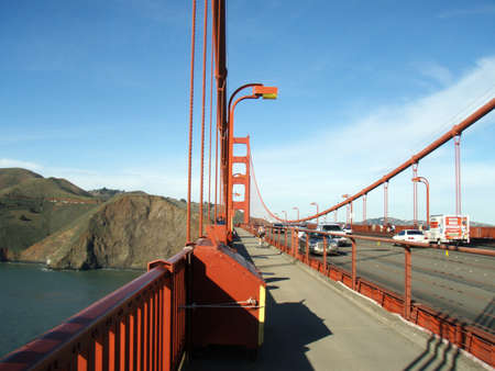 San Francisco - December 25, 2007: Art Deco Walkway and road on the Golden Gate Bridge with tower in the distance on a nice day.のeditorial素材