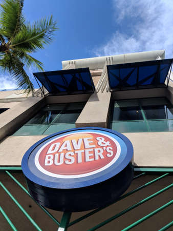 Honolulu - January 25, 2018: Dave and Buster's sign above entrance of venue.のeditorial素材
