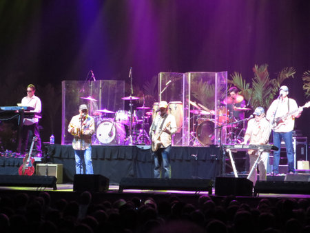 Honolulu - January 12, 2014: Beach Boys band plays on stage at the Neal S. Blaisdell Center in purple light.のeditorial素材