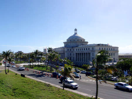 San Juan - January 13, 2009: Road and The Capitol of Puerto Rico Building (Spanish: Capitolio de Puerto Rico) is located on the Islet of San Juan just outside the walls of Old San Juan. The building is home to the bicameral Legislative Assembly, composed のeditorial素材