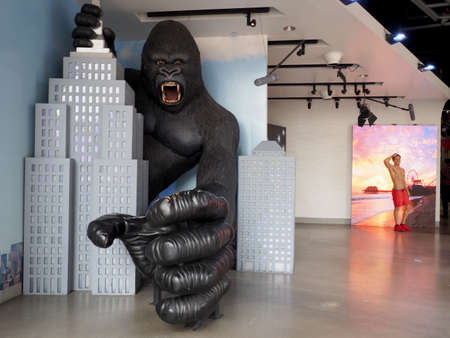 Hollywood, California - October 16, 2019: King Kong on empire state building and Baywatch Lifeguard on display at the Madame Tussauds Hollywood.のeditorial素材