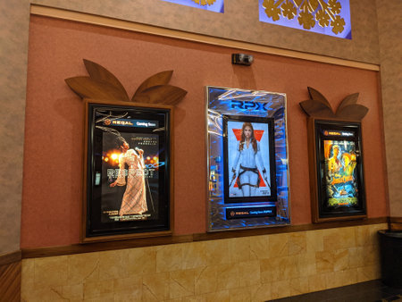 Honolulu - July 6, 2021:  Jungle Cruise, Black Widow, and Respect Movie Posters featuring Dwayne Johnson, Scarlett Johansson, and Emily Blunt inside Regal Theater Dole Cannery.のeditorial素材