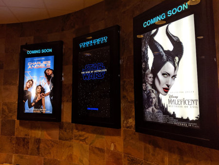 Honolulu - August 28, 2019:  Movie poster Ads featuring Star Wars The Rise of Skywalker, Charlies Angels, and Maleficent Mistress of Evil inside Ward Theater.のeditorial素材