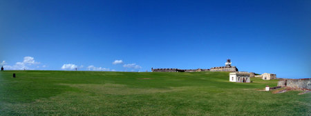Castillo San Felipe del Morro a Monumental 16th-century Spanish fortification atop cliffside promontory, cannons pointing seaward.の写真素材