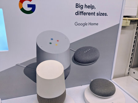 Honolulu - March 21, 2018: Close-up of Google Home, and Mini on Display big help, different sizes inside Bed, Bath, and Beyond Store.  Google LLC is an American multinational technology company that specializes in Internet-related services and products, wのeditorial素材