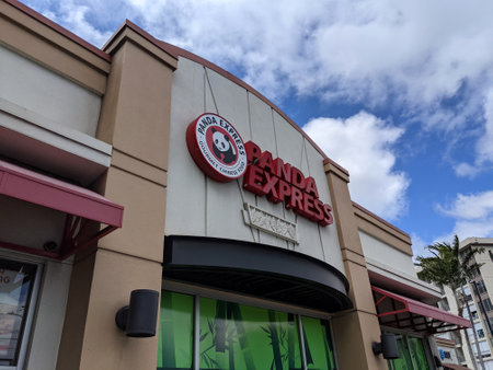 Honolulu - September 25, 2021: Panda Express Sign on side off building above store.のeditorial素材
