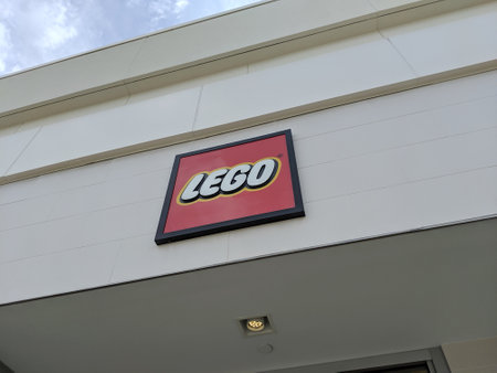 Honolulu - August 30, 2019:  Lego sign above store entrance.  Lego is a line of plastic construction toys that are manufactured by The Lego Group, a privately held company based in Billund, Denmark.のeditorial素材