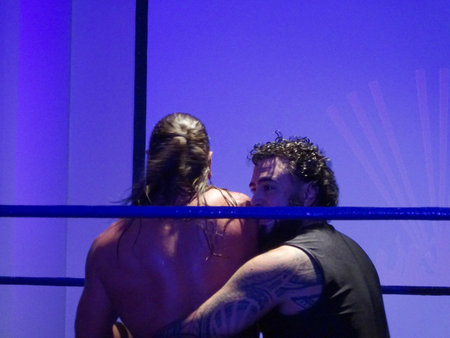 Honolulu - November 17, 2019: Wrestler âThe PINEAPPLE KINGâ Aleki holds James Storm in a waist lock in the ring at UCE Wrestling event at Dave and Busters in Honolulu, Hawaii.のeditorial素材