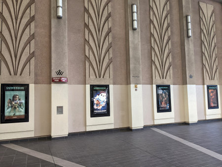Honolulu - November 1, 2021: Row of movie posters including Dune, Ron's Gone Wrong, Venom, and Halloween Kills on wall located outside the movie theater at the Ward Village.のeditorial素材