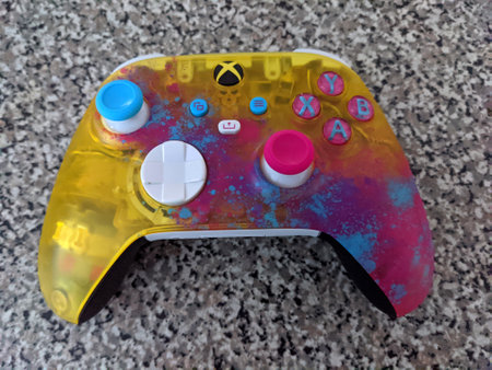 Waikiki - November 10, 2021: New Microsoft Xbox Forza Horizon 5 yellow pink and blue transparent...
