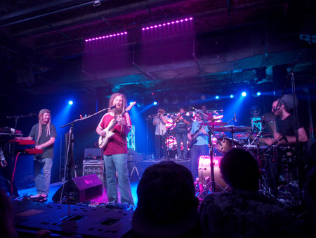 Honolulu - February 22, 2018: Mike Love Band plays music indoors with cool lighting at Crossroads at Hawaiian Brians in Honolulu, Hawaii.のeditorial素材