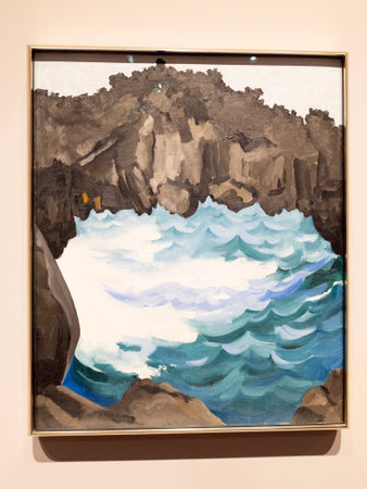 Honolulu - April 1, 2022:  painting by Georgia OâKeeffe that depicts a black lava bridge on the Hana coast of Maui, Hawaii. The painting was created in 1939, when OâKeeffe visited Hawaii as part of a commission from the Dole Pineapple Company. She wasのeditorial素材