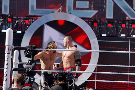 Santa Clara, California -March 29, 2015: A dynamic action shot of WWE Superstar Seth Rollins delivering a forearm smash to his rival Randy Orton during their match at WrestleMania 31, the biggest event in sports entertainment, in front of a sold-out crowdのeditorial素材
