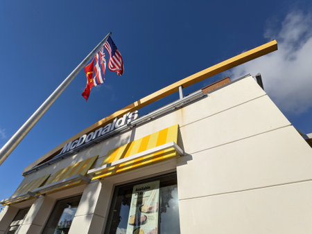 Honolulu - January 6, 2021: A bright and spacious McDonaldâs restaurant with a contemporary design, located in the Kahala Mall shopping center in Honolulu, Hawaii. The restaurant features a large McDonaldâs logo, a flagpole with the Hawaiian and Ameriのeditorial素材