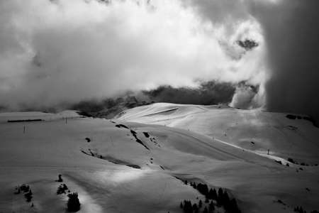 Mountain Range with snow and treesの写真素材