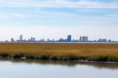 Looking across the bay at the Atlantic City skyline on a clear dayの写真素材