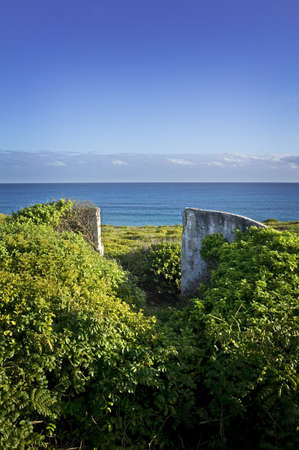 Abandoned ruins and entry way overlooking the Gulf of Mexicoの写真素材