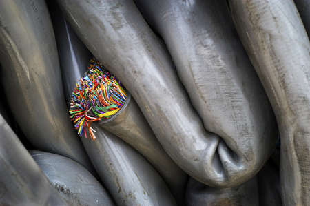 Heavy Gray Bundles of Wire with Colorful Openingの写真素材