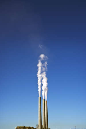 3 Smoke Stacks at a Power Plantの写真素材