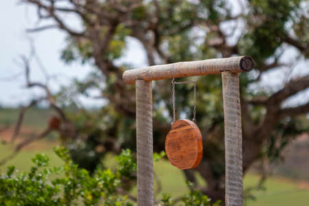farm board with blurred vegetation in the background,の写真素材