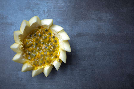 Passion fruit on gray background, view from above, free area for edits.の写真素材