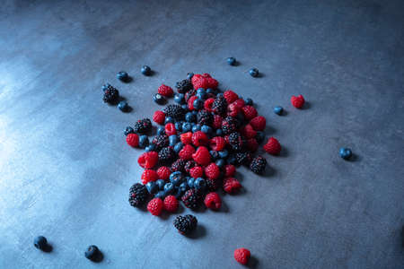 berries an abstract gray background seen from above.