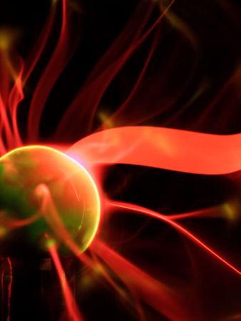 Colorful plasma lamp experiment on a black backgroundの写真素材