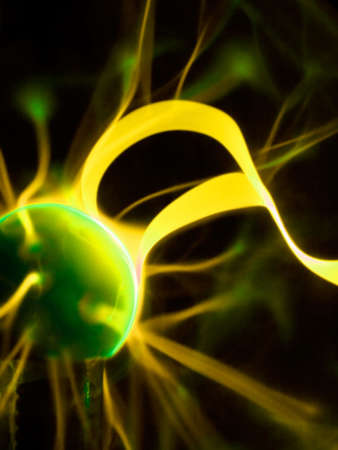 Colorful plasma lamp experiment on a black backgroundの写真素材