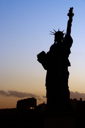 Silhouette of the Parisian Statue of Liberty - Paris, Franceの写真素材