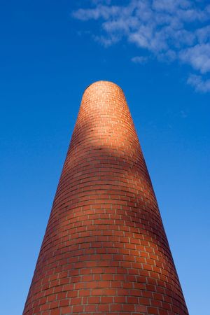 A brick chimney, symbol of the industrial history of the Bercy area - Paris, Franceの写真素材