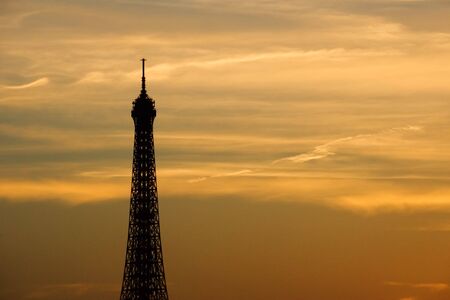 Silhouette of the Eiffel tower at sunset - Paris, Franceの写真素材