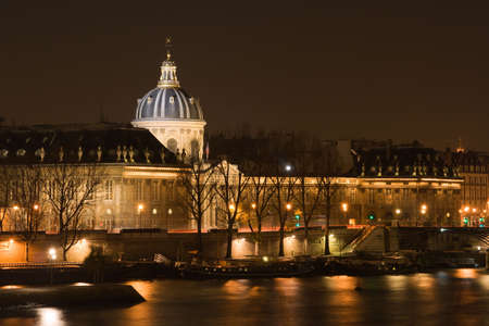 The French Institute and the Seine river at night - Paris, Franceの写真素材