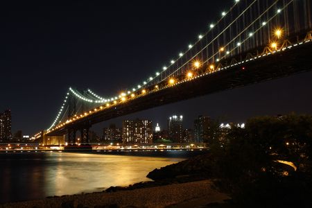 Manhattan Bridge and skyline at dusk from Brooklyn - New York City, USA