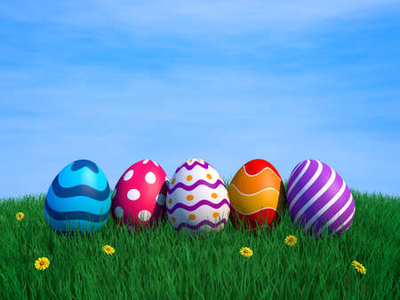 Decorated easter eggs on green grass with copy space (3D render)の写真素材