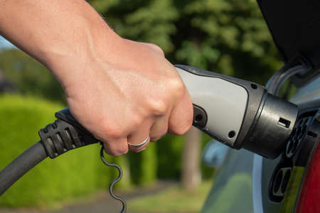 Electric car charging fuel plugの写真素材