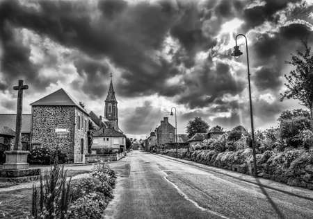 St-Fraimbault village on a overcast day in summer 2017, Normandy Franceのeditorial素材